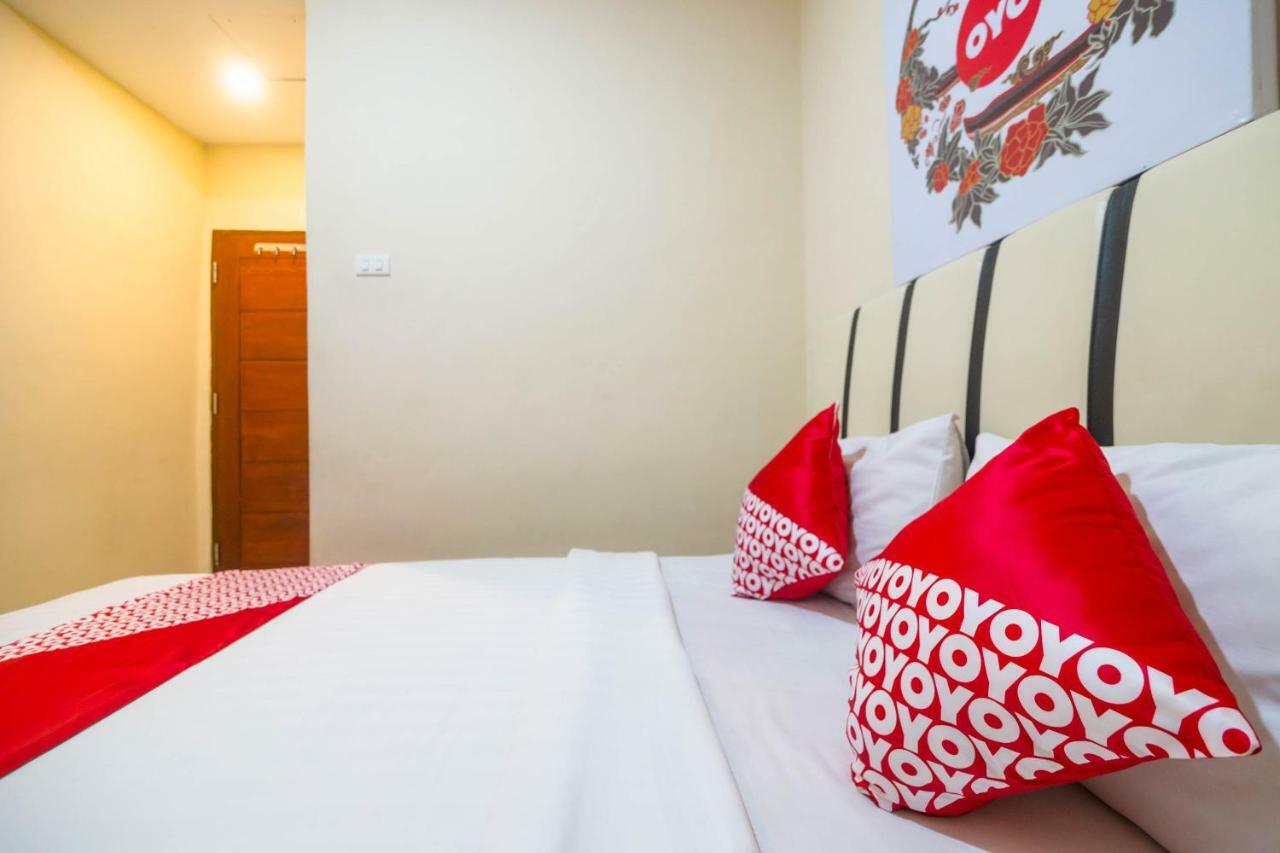 Sentosa Guest House Pontianak Extérieur photo
