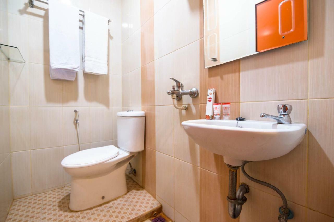 Sentosa Guest House Pontianak Extérieur photo