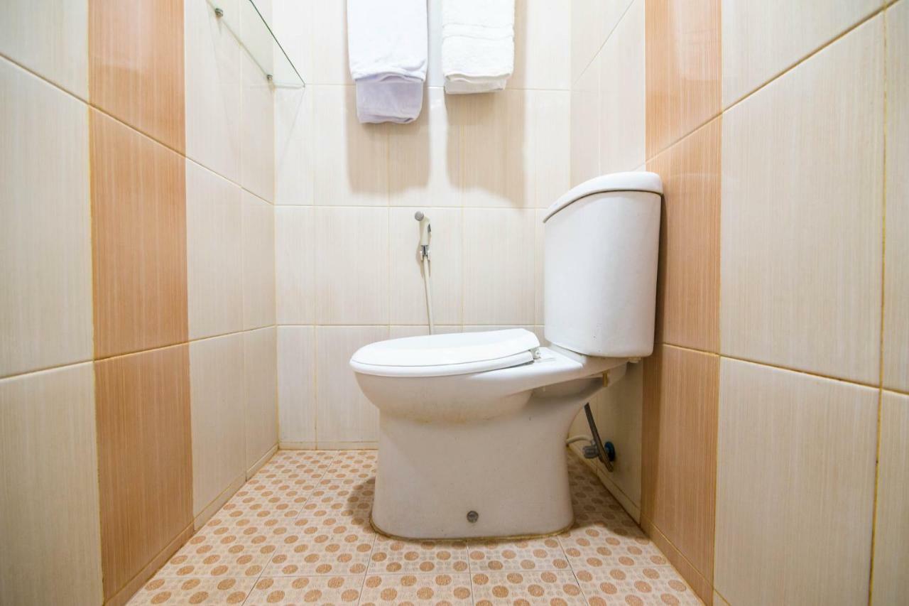 Sentosa Guest House Pontianak Extérieur photo
